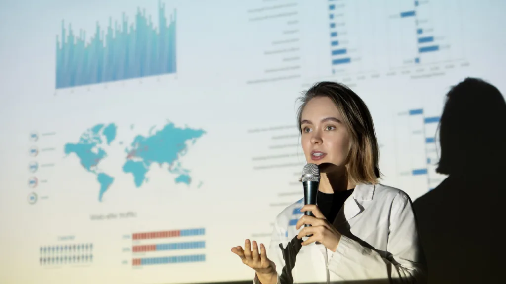 Female entrepreneur pitching to investors