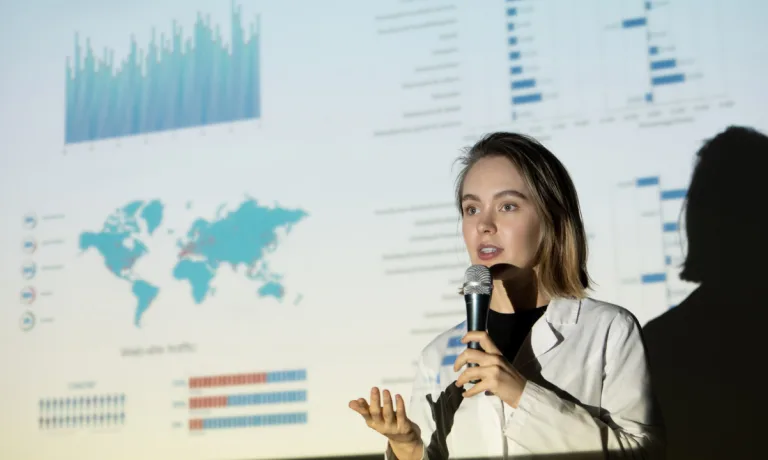Female entrepreneur pitching to investors
